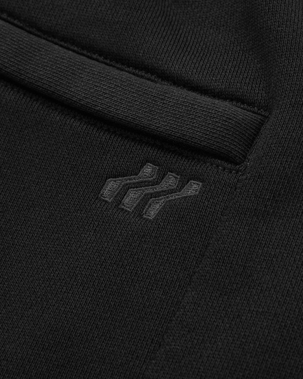 Black shorts on a light gray background
