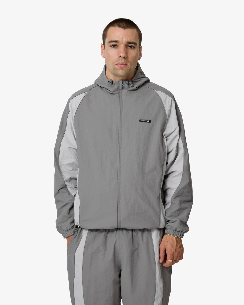 Gray jacket with a hood on a white background