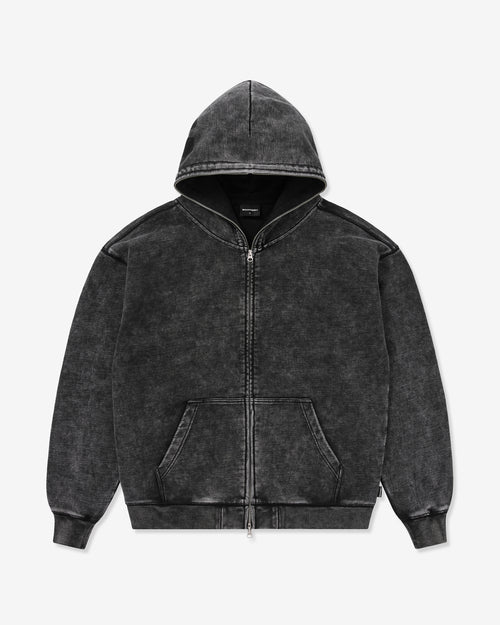 Black hoodie on a light gray background
