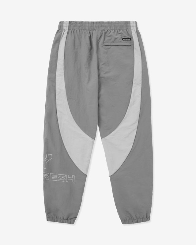 Gray sweatpants with a large white swoosh logo on a white background