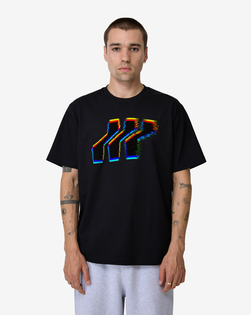 Black t-shirt with colorful logo on a white background