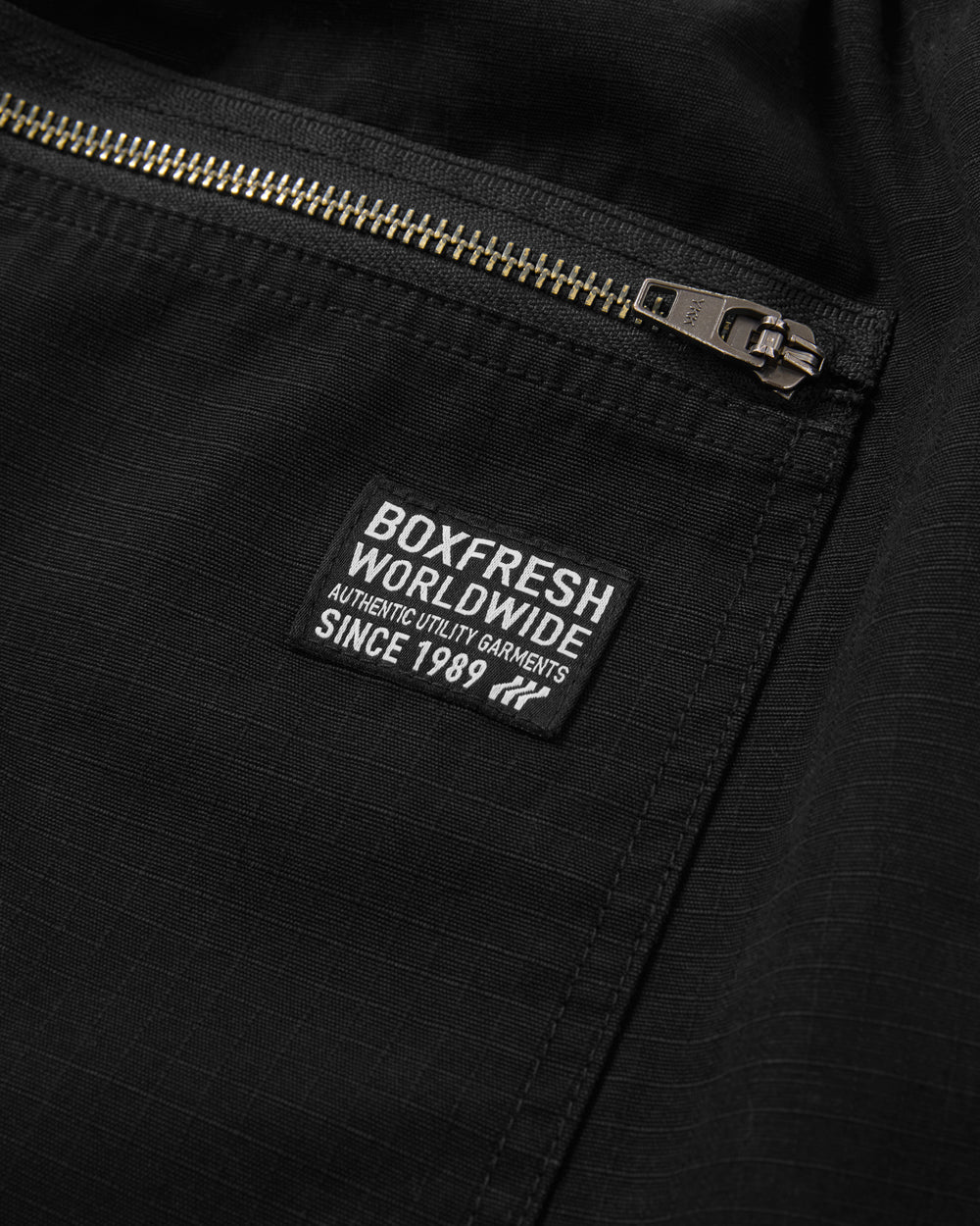 Black pants with zippers on a white background