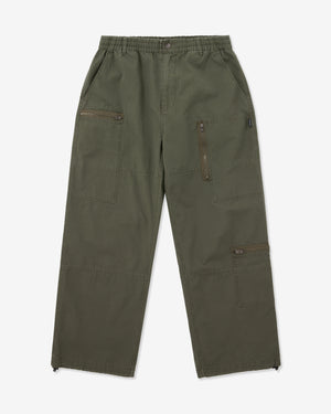 Green cargo pants on a white background