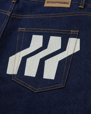 Close-up of a blue denim pocket with a white geometric design and 'BOXFRESH' branding.